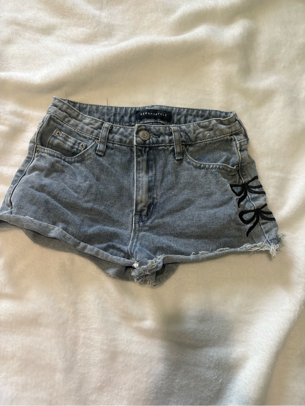 Aeropostale Women's Light Blue Denim Cutoff Shorts with Black Bow Accent